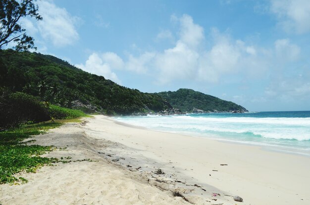 Photo scenic view of beach against sky