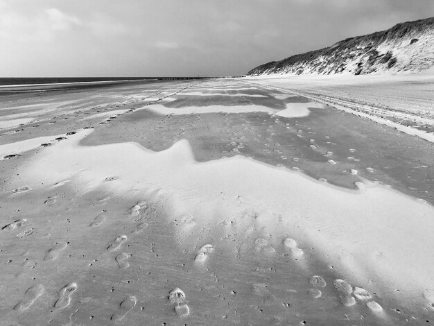 Photo scenic view of beach against sky