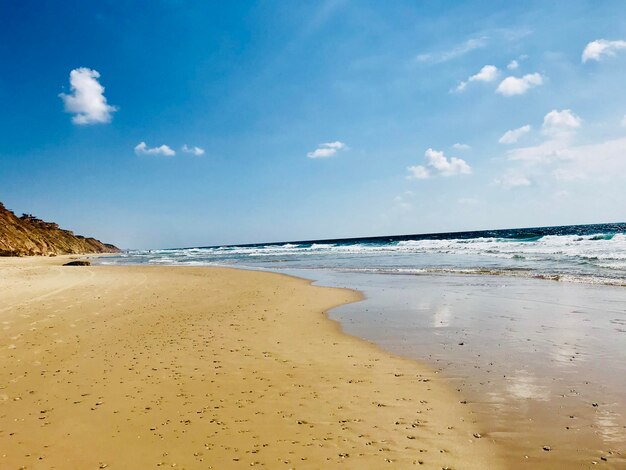 Scenic view of beach against sky