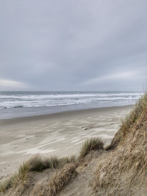 Scenic view of beach against sky