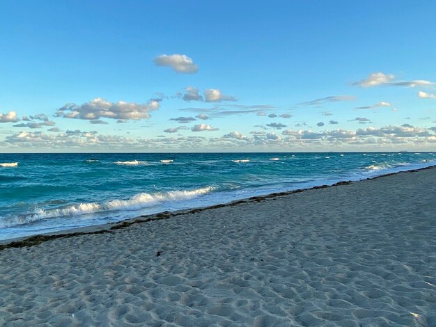 Photo scenic view of beach against sky