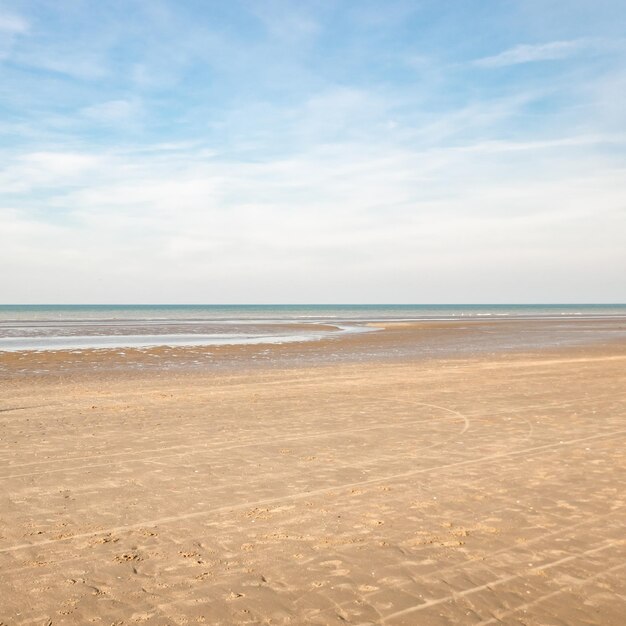 Photo scenic view of beach against sky