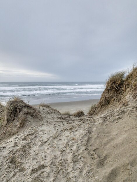 Photo scenic view of beach against sky