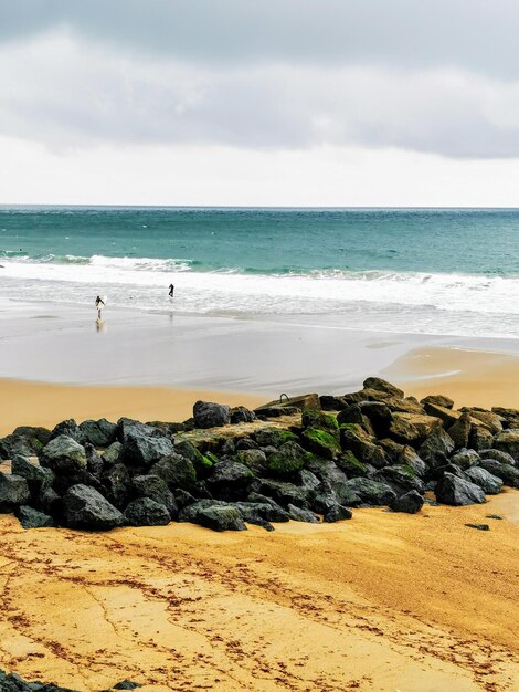 Photo scenic view of beach against sky