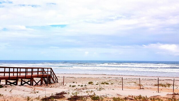 Scenic view of beach against sky