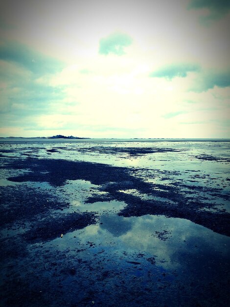 Photo scenic view of beach against sky