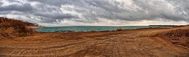 Scenic view of beach against sky