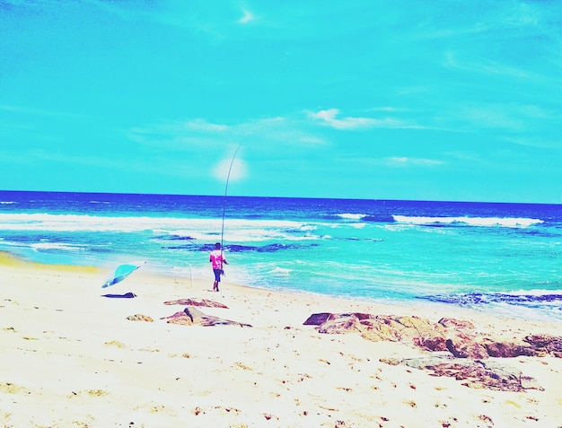 Photo scenic view of beach against sky