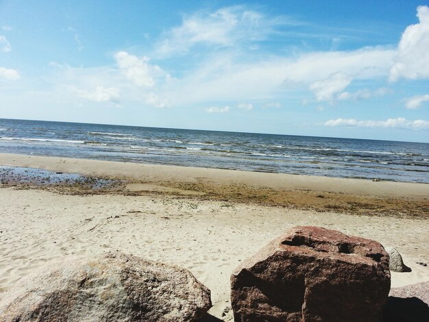 Scenic view of beach against sky