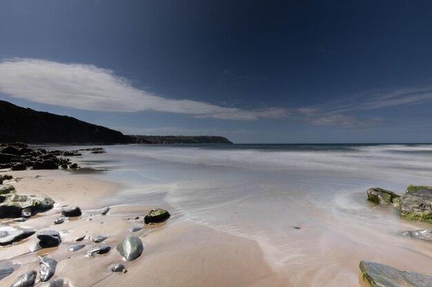 Photo scenic view of beach against sky