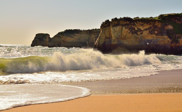 Photo scenic view of beach against sky