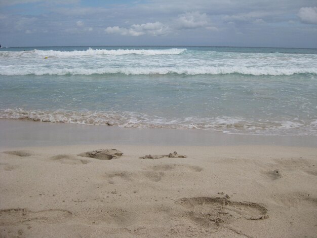 Photo scenic view of beach against sky