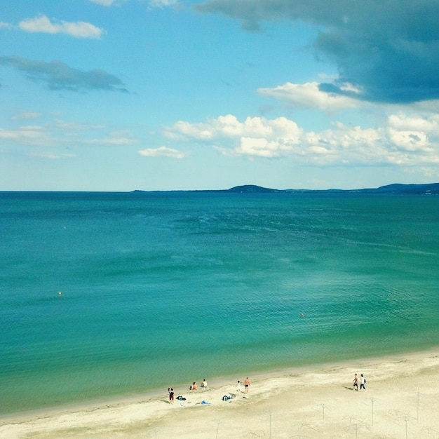 Scenic view of beach and sea against sky