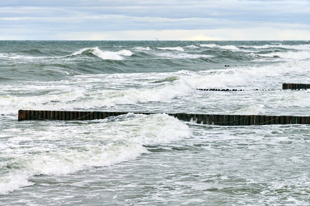 Scenic view of blue sea with foaming waves.