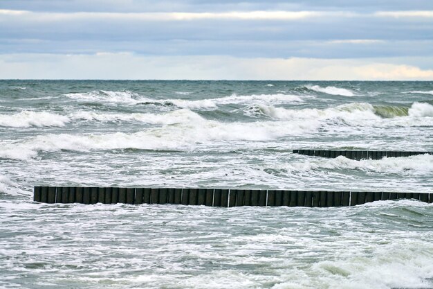 Scenic view of blue sea with foaming waves