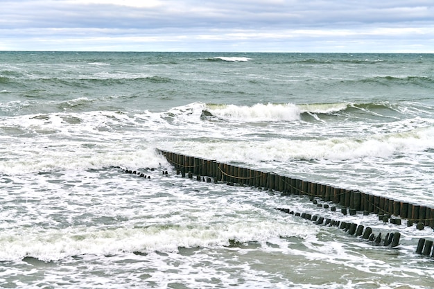 Scenic view of blue sea with foaming waves