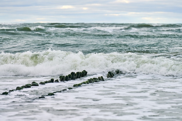 Scenic view of blue sea with foaming waves