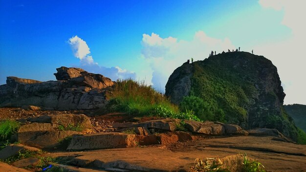 Scenic view of cliff against sky