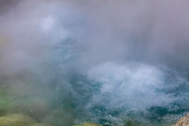 Photo scenic view of clouds over mountain