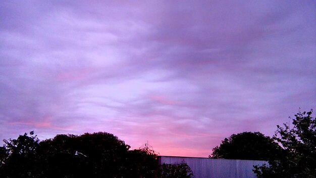 Scenic view of cloudy sky at sunset