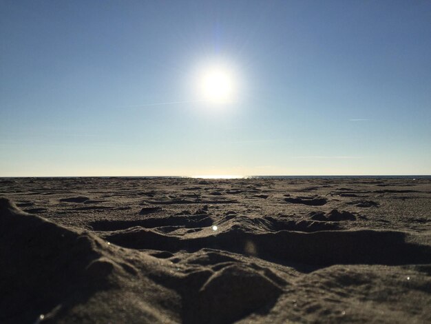 Scenic view of desert against clear sky