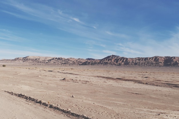 scenic view of desert against sky