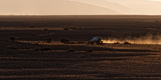 Photo scenic view of desert against sky