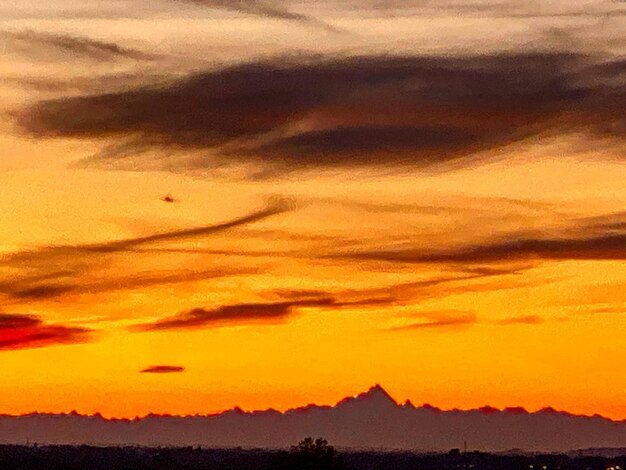 Scenic view of dramatic sky during sunset