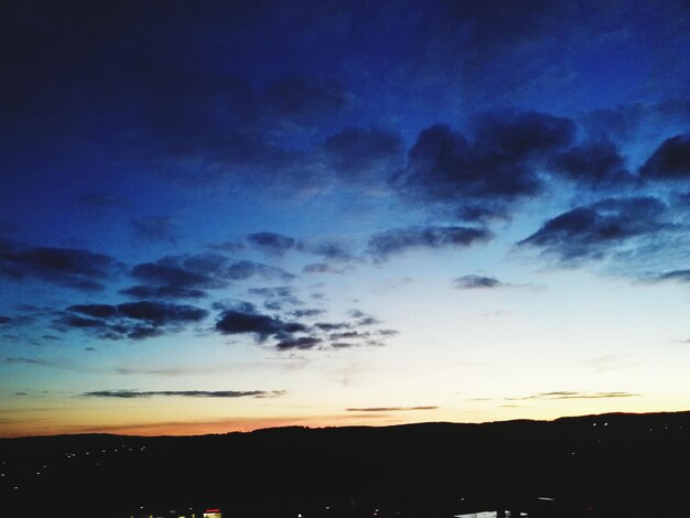 Scenic view of dramatic sky during sunset