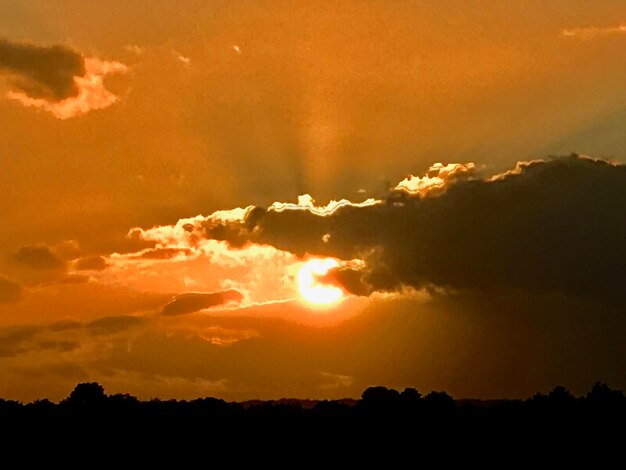 Scenic view of dramatic sky during sunset