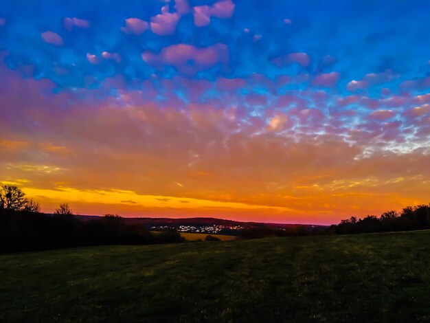 Scenic view of dramatic sky during sunset