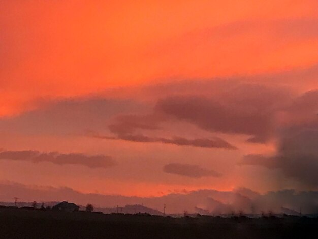 Scenic view of dramatic sky during sunset