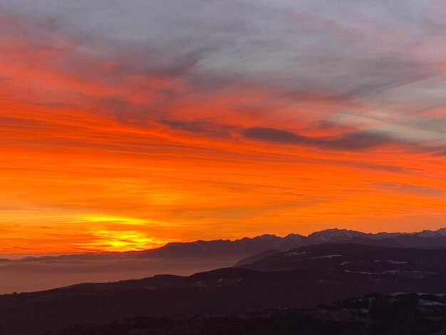 Scenic view of dramatic sky during sunset