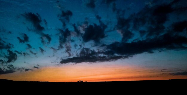 Scenic view of dramatic sky during sunset