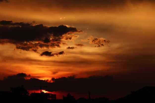 Scenic view of dramatic sky during sunset