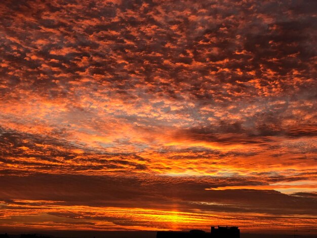 Scenic view of dramatic sky during sunset