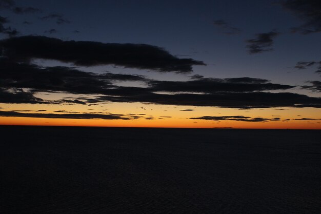 Scenic view of dramatic sky during sunset