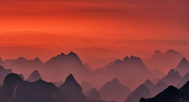 Photo scenic view of dramatic sky during sunset