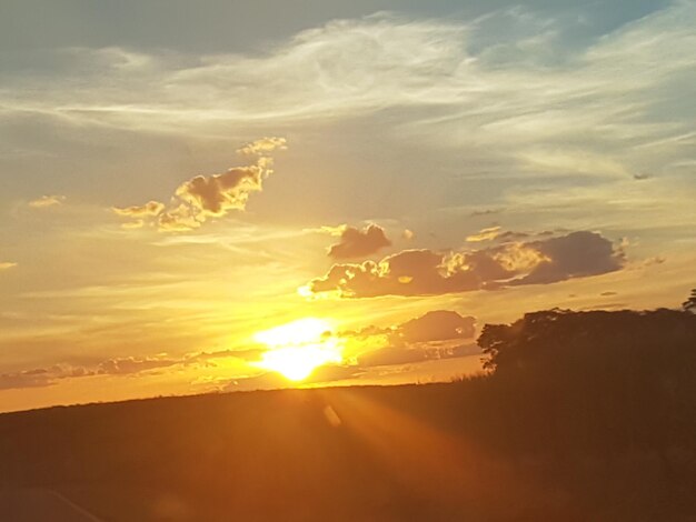 Scenic view of dramatic sky during sunset