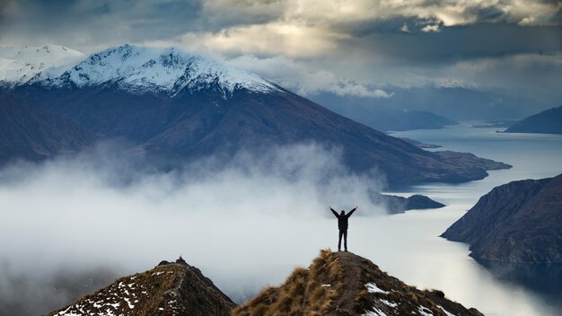 Photo scenic view of dramatic sky over mountains