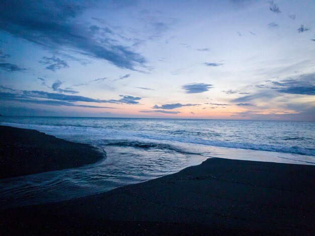 Scenic view of dramatic sky over sea