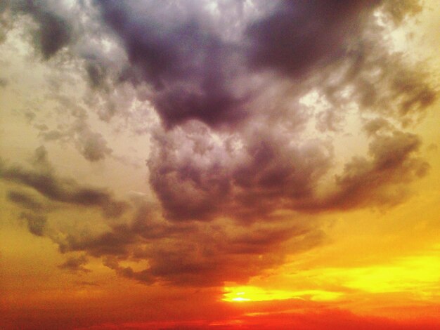 Scenic view of dramatic sky at sunset