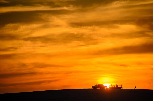 Scenic view of dramatic sky during sunset