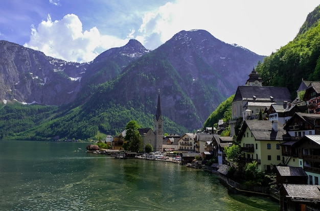 Scenic view of famous Hallstatt mountain village with Hallstatter lake