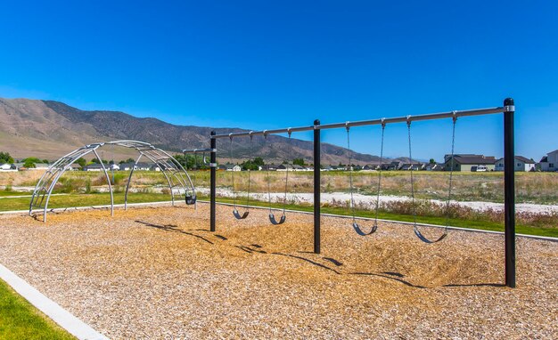 Scenic view of field against clear blue sky