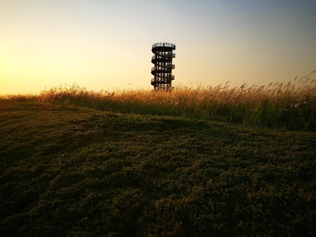 Photo scenic view of field against clear sky