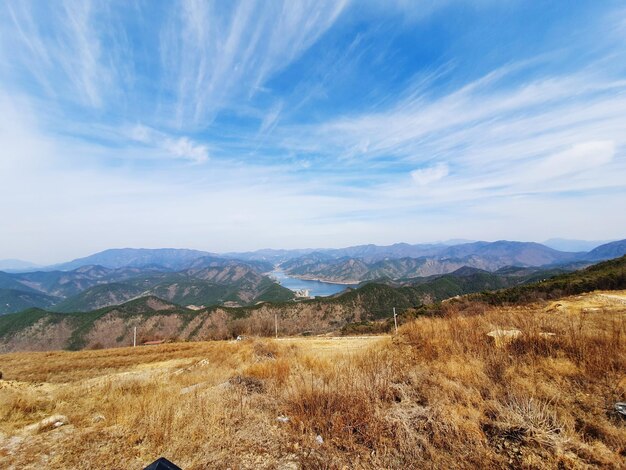 Photo scenic view of field against sky