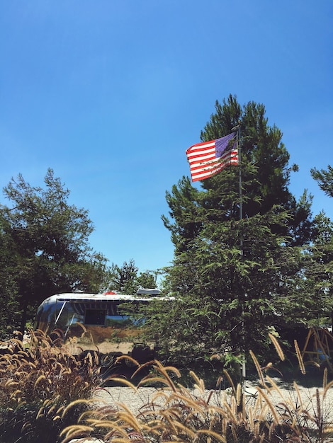 Photo scenic view of flag against clear sky