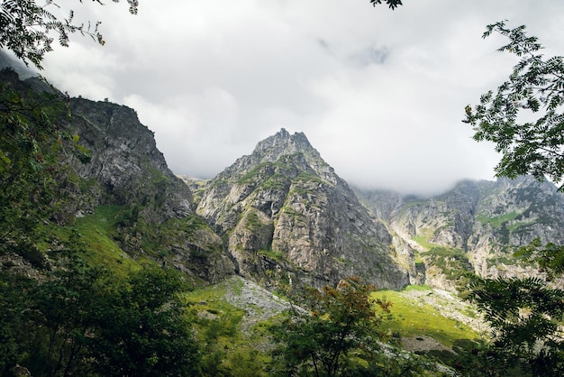 Scenic view of foggy rocky mountains near the Morskie Oko lake High Tatras Zakopane Poland Foggy day