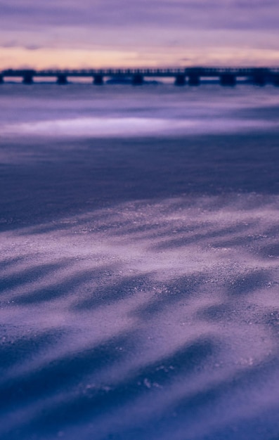 Photo scenic view of a frozen beach in lomma